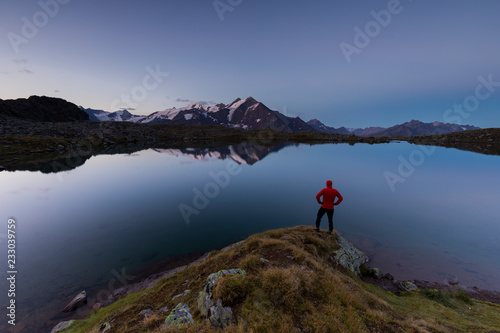 hiker in the mountain at sunrise © Andrea