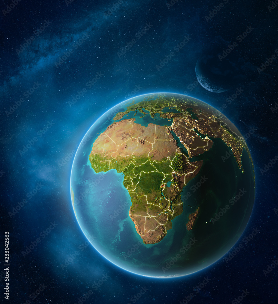 Fototapeta premium Planet Earth with highlighted Rwanda in space with Moon and Milky Way. Visible city lights and country borders.