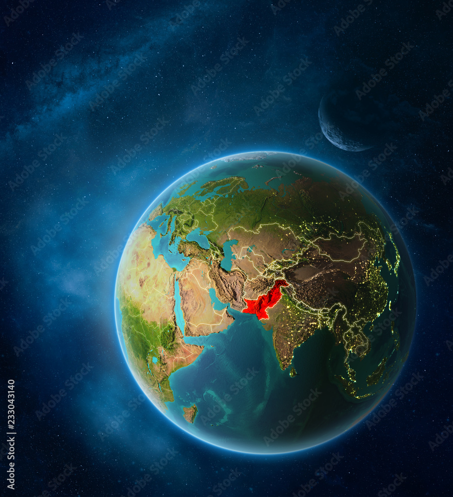 Planet Earth with highlighted Pakistan in space with Moon and Milky Way. Visible city lights and country borders.