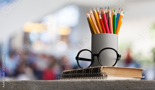 School Backpack with stationery on background