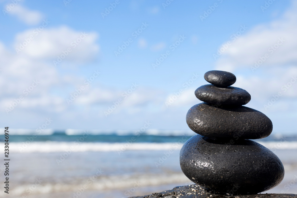 Stones stacked on top of each other on an ocean floor Stones stacked on top of each other on an ocean floor