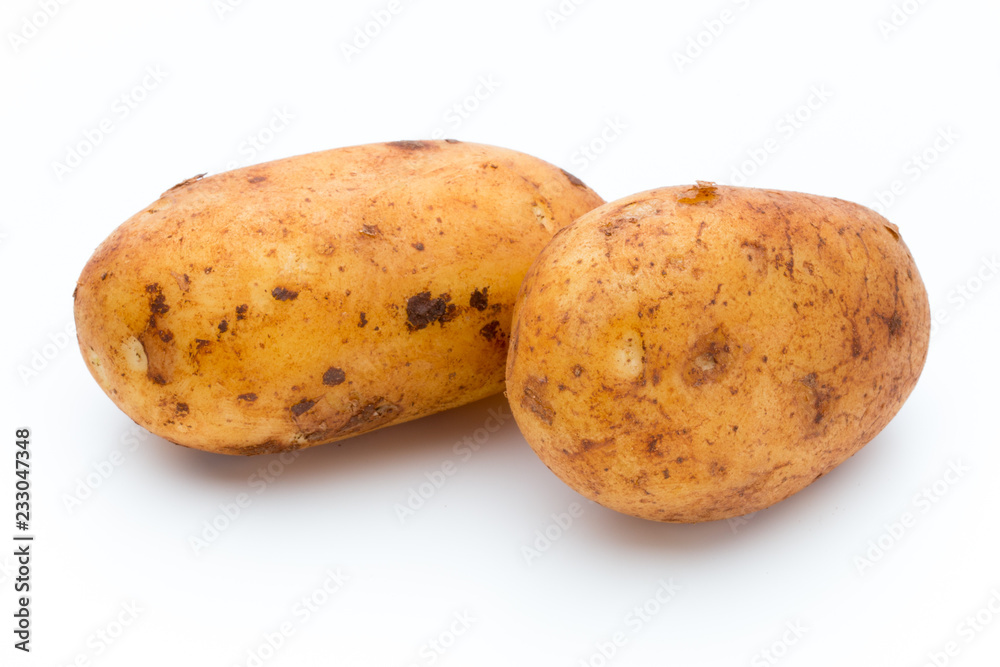 A bio russet potato isolated white background. A bio russet potato isolated white background.