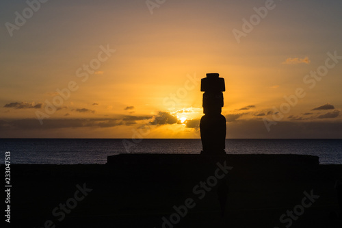 Moia silhouette in Easter Island during the sunset © Erlantz