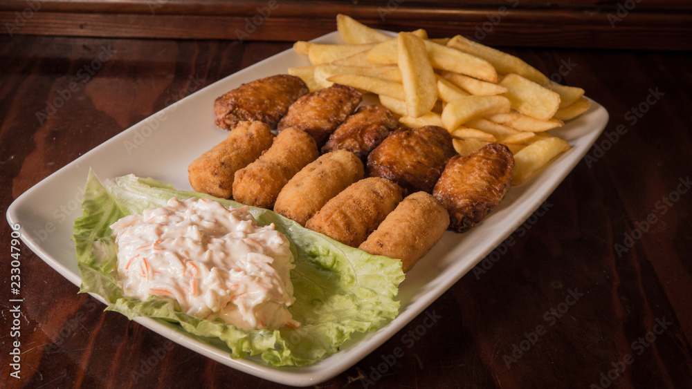 Croquettes with chips and surimi salad Croquettes with chips and surimi salad
