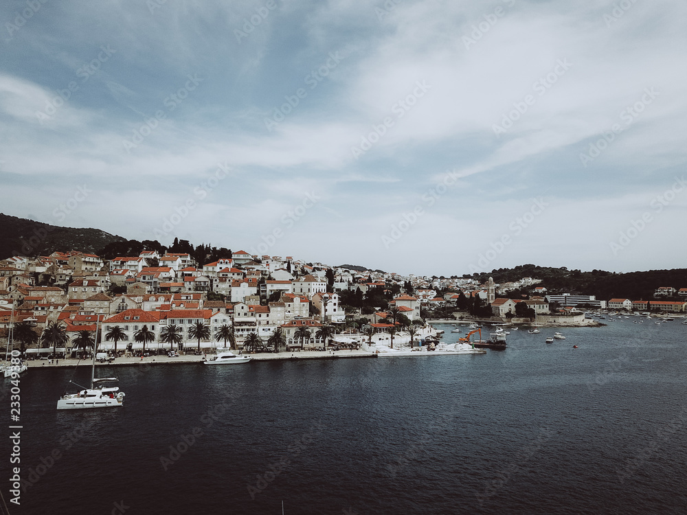 Aerial view photo of picturesque port with sailboats and yachts Aerial view photo of picturesque port with sailboats and yachts