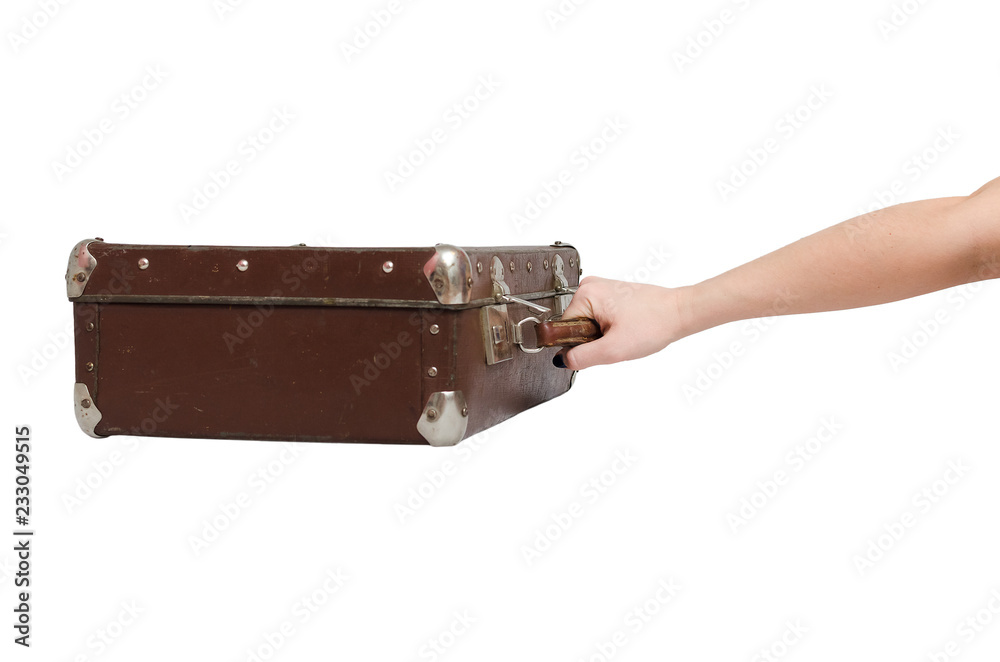 Retro suitcase and female hands isolated on the white background. Retro suitcase and female hands isolated on the white background.