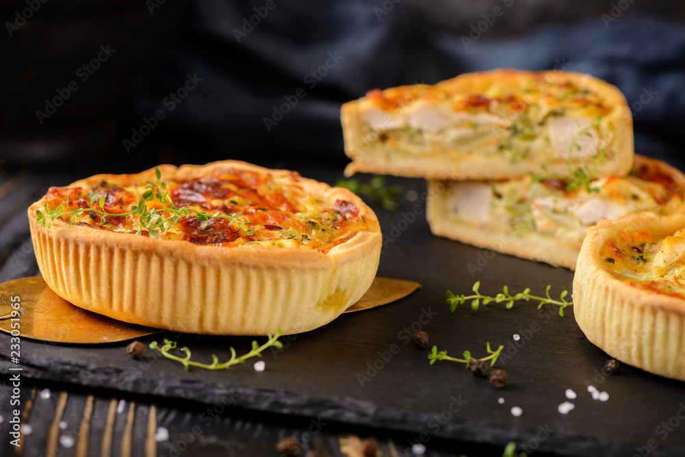 Meat mini pie on the wooden board on table background, closeup with copy space, rustic style Meat mini pie on the wooden board on table background, closeup with copy space, rustic style