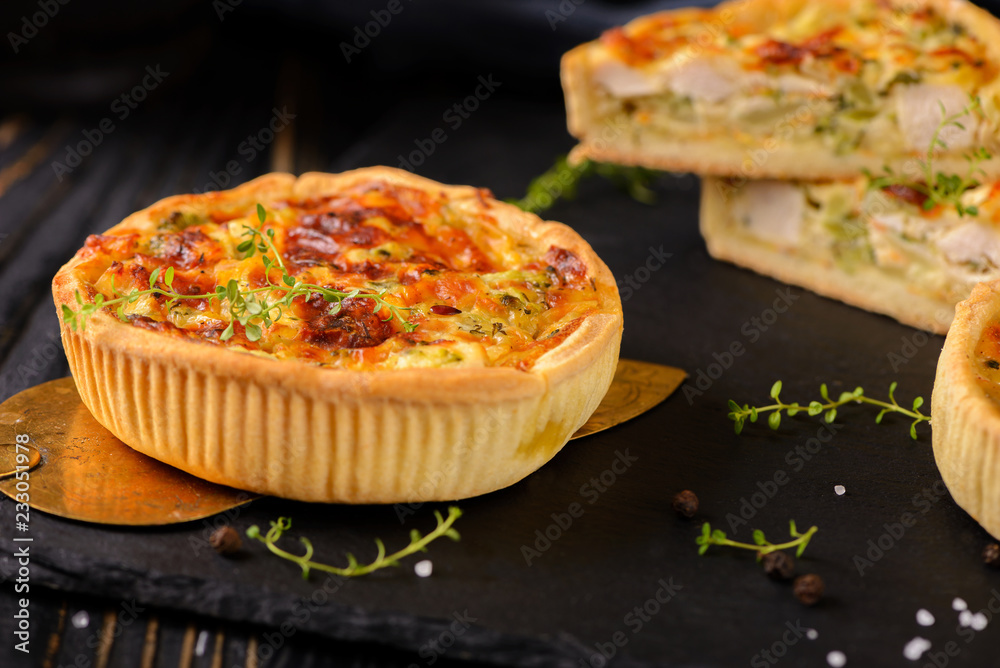 Meat mini pie on the wooden board on table background, closeup with copy space, rustic style Meat mini pie on the wooden board on table background, closeup with copy space, rustic style