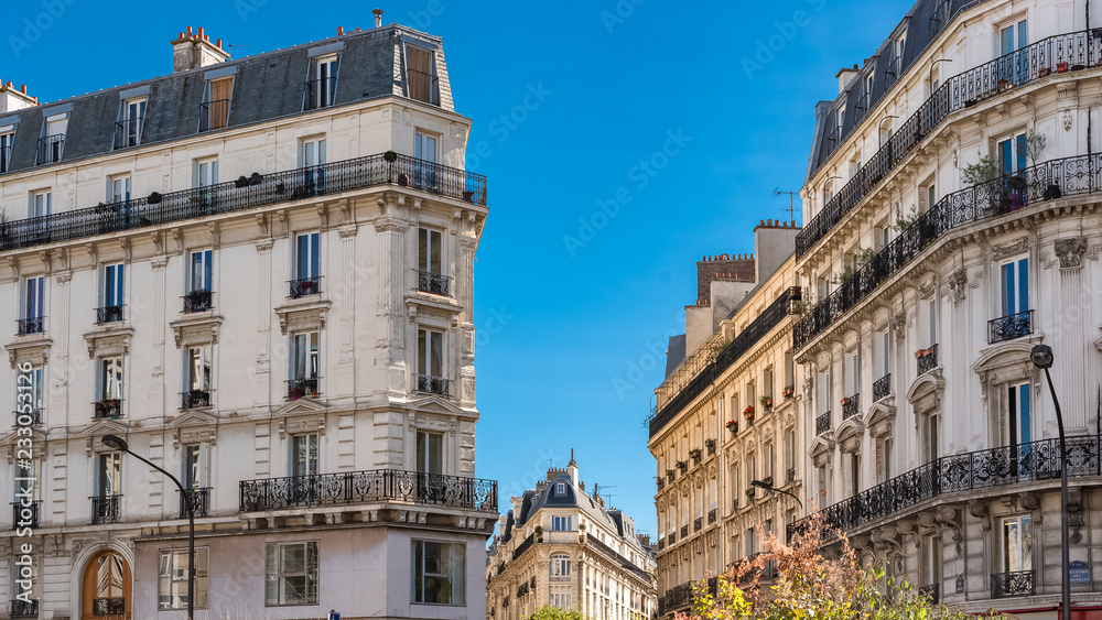     Paris, beautiful buildings boulevard des Batignolles, typical parisian facade 
