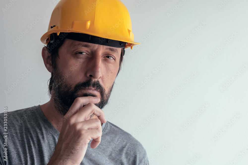 Portrait of serious thoughtful construction engineer Portrait of serious thoughtful construction engineer