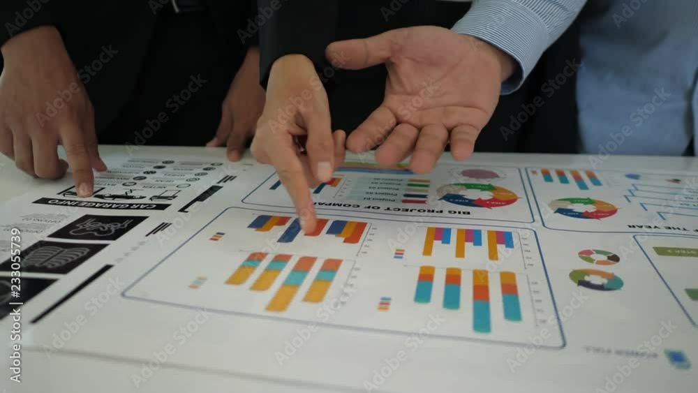 Group business people working during explain discussions on financial charts and business graphs