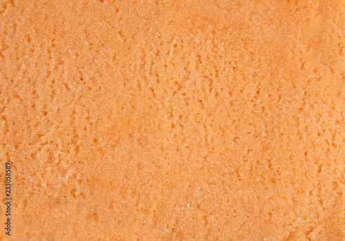 Bright peach texture. Top view.