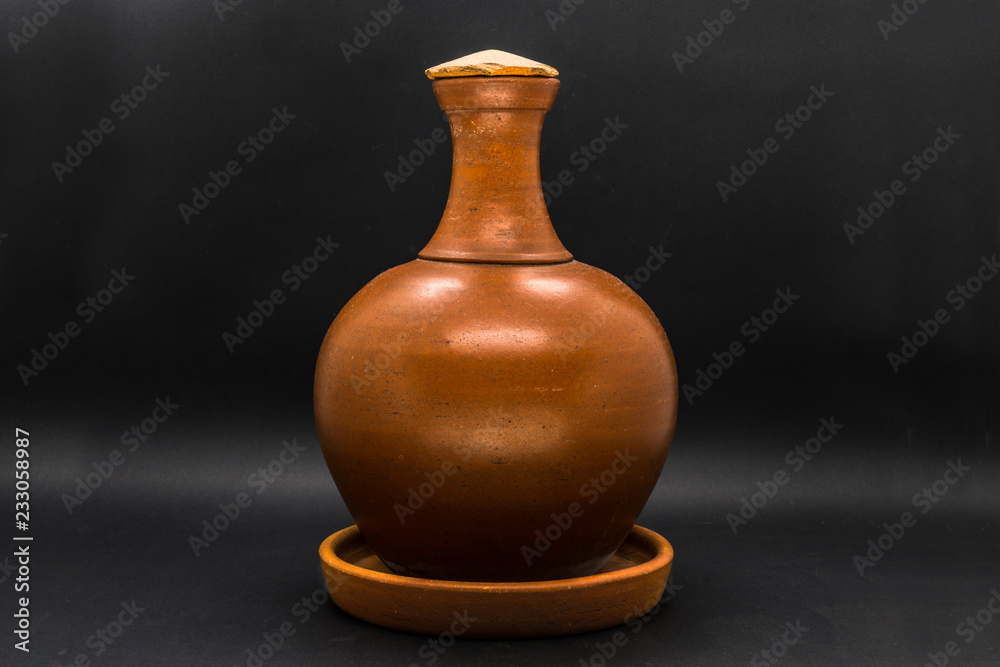 Water clay pot isolated.