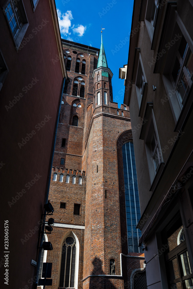 View of Kaletnicza Street from famous Dluga Street ,leading to St.Mary's Church , in the picturesque Main Town of Gdansk, Poland