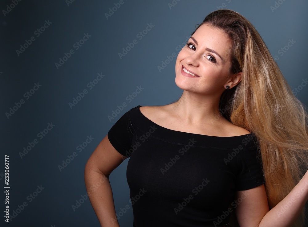Portrait of a caucasian woman in front of a blue background Portrait of a caucasian woman in front of a blue background