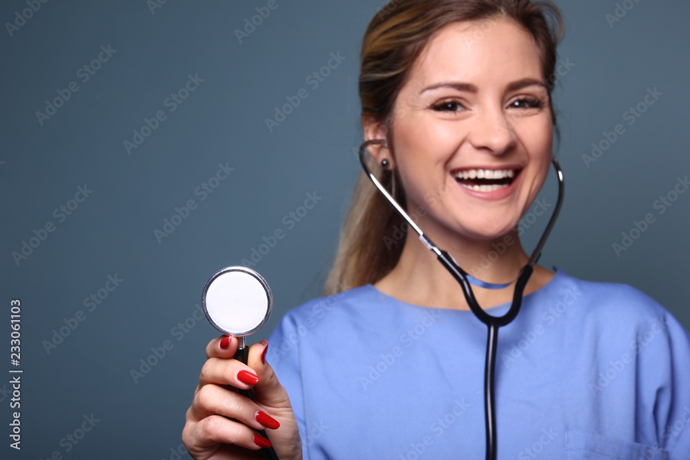 Portrait of a caucasian woman in front of blue background Portrait of a caucasian woman in front of blue background