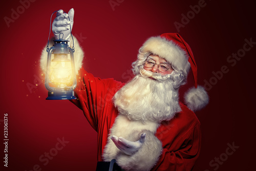 santa claus with lantern photo