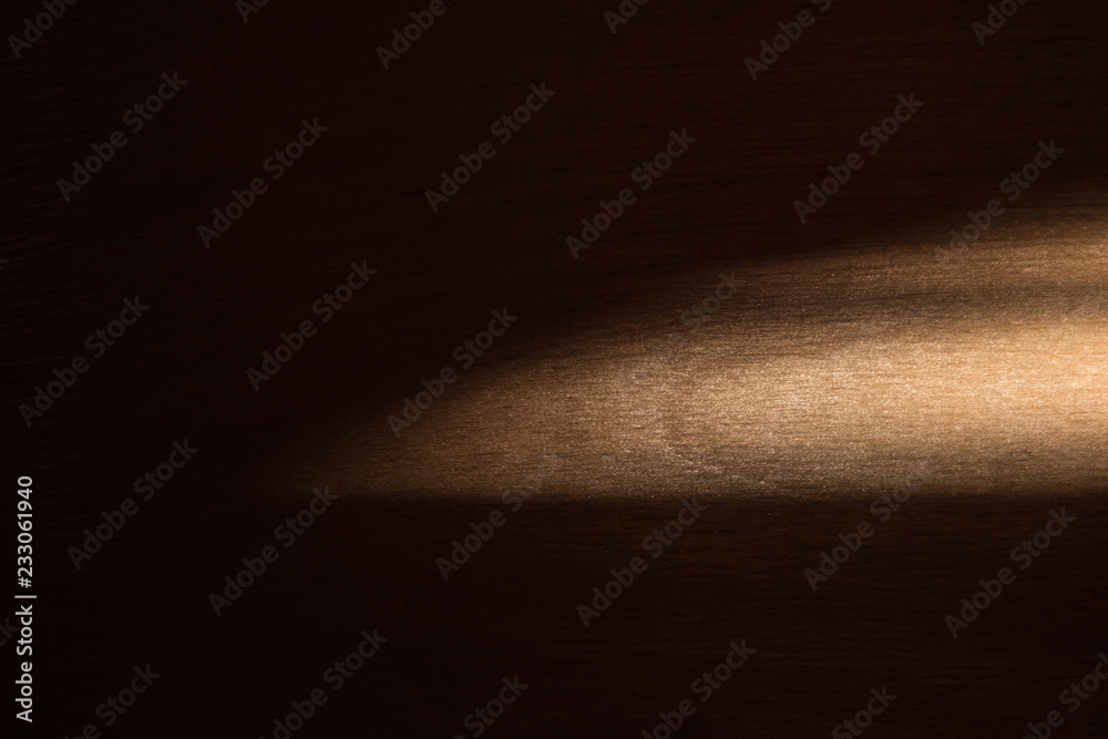 the dark wood surface with a light spot, architecture abstraction background the dark wood surface with a light spot, architecture abstraction background