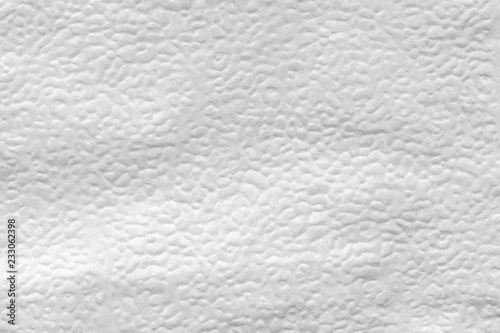 texture of the relief surface of the paper napkin, close up abstraction background