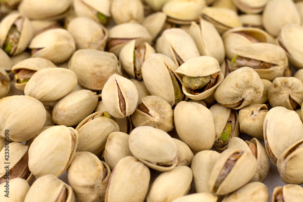 Nuts pistachios are not cleaned. Background, texture. Nuts pistachios are not cleaned. Background, texture.