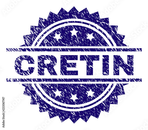 CRETIN stamp seal watermark with distress style. Blue vector rubber print of CRETIN label with scratched texture.