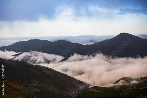 On the road around Ardabil Province, Iran. Big clouds came over the mountain range. Adventure atmosphere so much clouds. photo