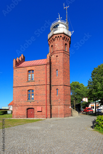 Ustka, Pomerania, Poland - Historic lighthouse building at the Baltic Sea shoreline and Slupia river in Ustka