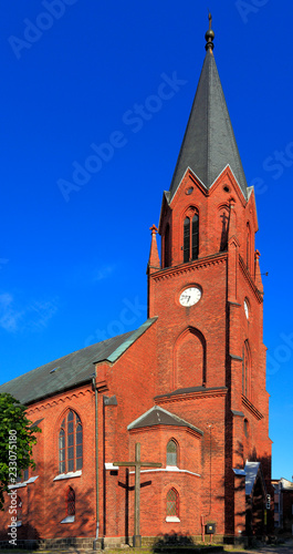 Ustka, Pomerania, Poland - Neo-gothic church of Holiest Saviour in Ustka at the Baltic Sea shoreline