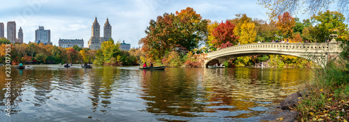 Panoramic view of autumn landscape with Bow bridge in Central Park. New York City. USA photo