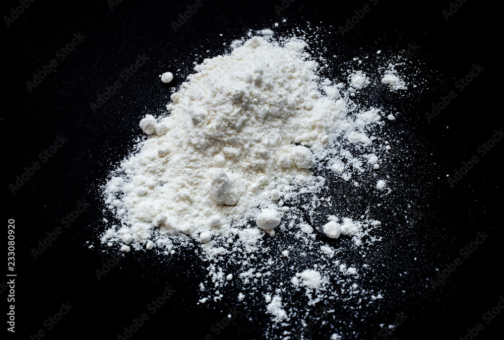 bunch of flour on a black background bunch of flour on a black background