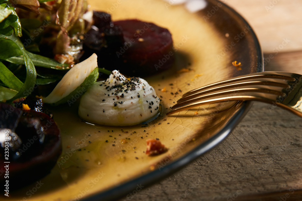 Restaurant food salad with roasted beetroot beet, Goat Cheese