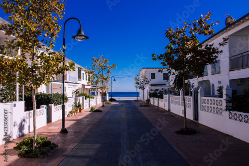 Obraz na plátně Sunny day on the street of La Cala de Mijas
