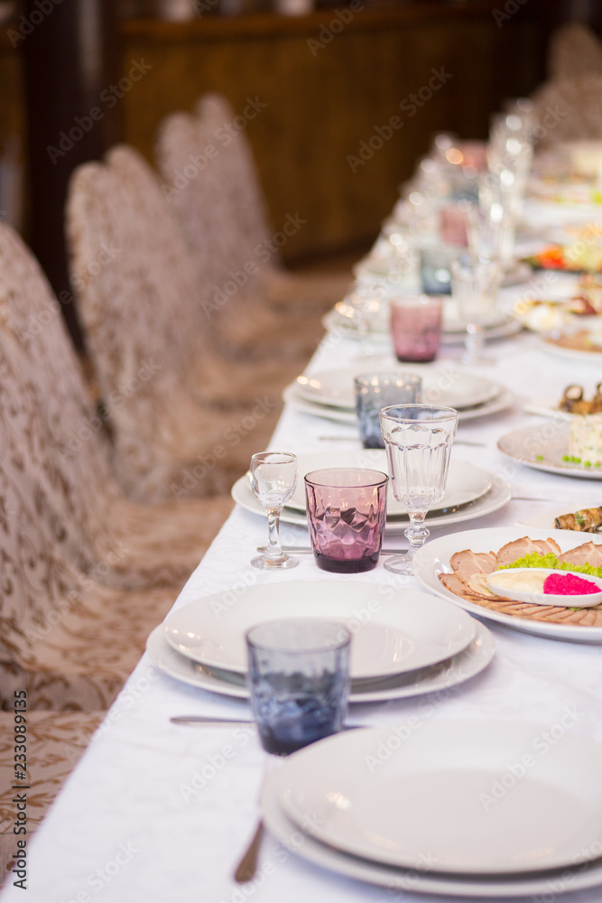 long served feast table.festive table in the restaurant.Interior of the banquet hall in the cafe.