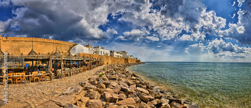 HAMMAMET, TUNISIA - OCT 2014: Cafe on stony beach of ancient Medina on October 6, 2014 in Hammamet, Tunisia