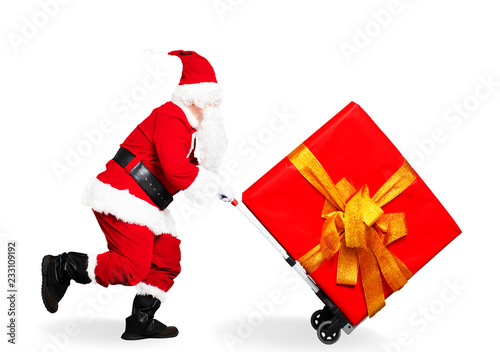 Happy running Santa Claus with  shopping cart trolley