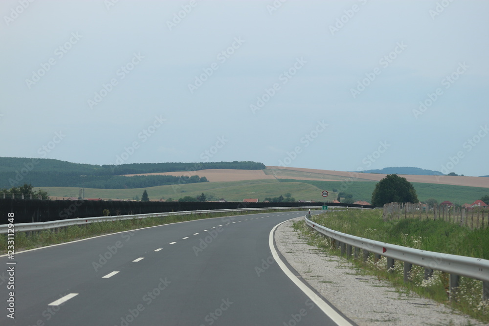 Fototapeta premium Empty highway road in the mountains, Hungary