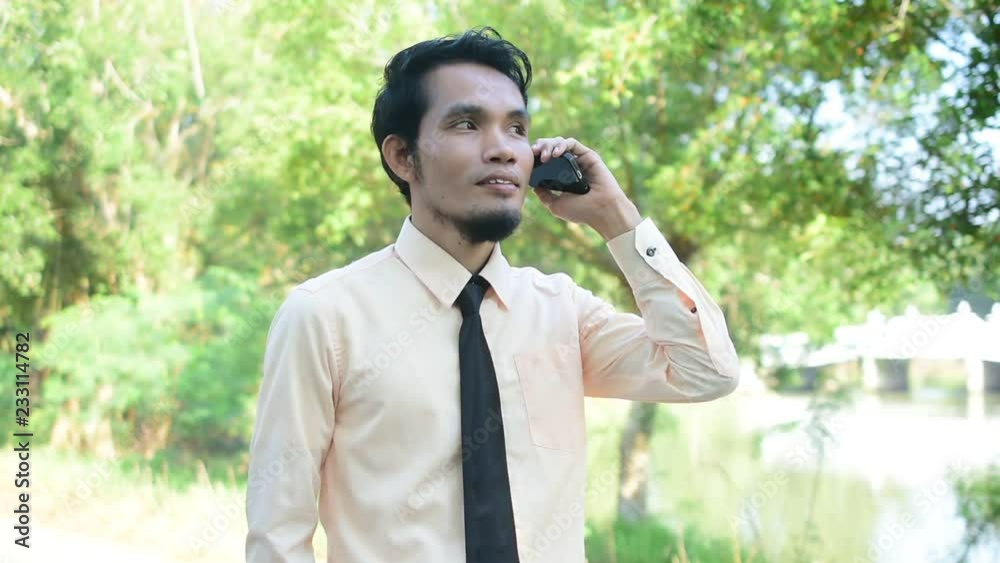 Businessman holding smart phone or mobile phone using call and happy smile success Businessman holding smart phone or mobile phone using call and happy smile success