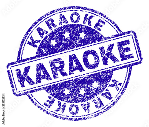 KARAOKE stamp seal imprint with distress texture. Designed with rounded rectangles and circles. Blue vector rubber print of KARAOKE title with retro texture.