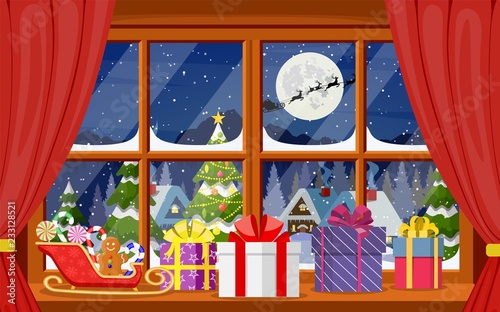 Santa claus and his reindeer in window.