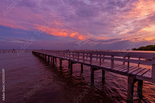 sunset at the bridge with red cloud on sky