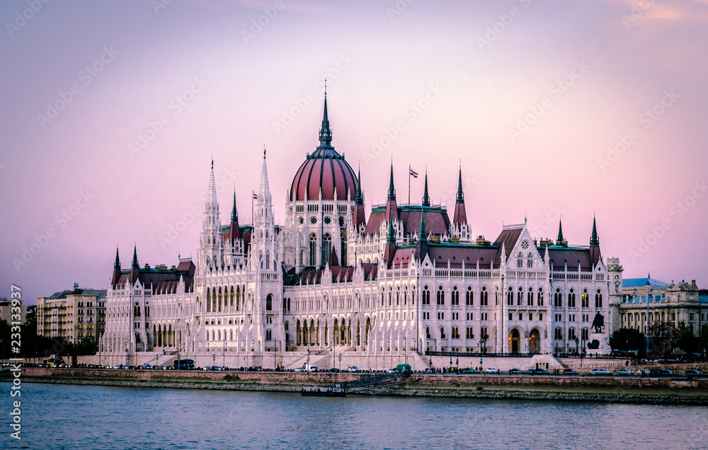 The Hungarian Parliament Building (a.k.a. the Parliament of Budapest) a landmark and popular tourist destination in Budapest. It lies in Lajos Kossuth Square, on the bank of the Danube.