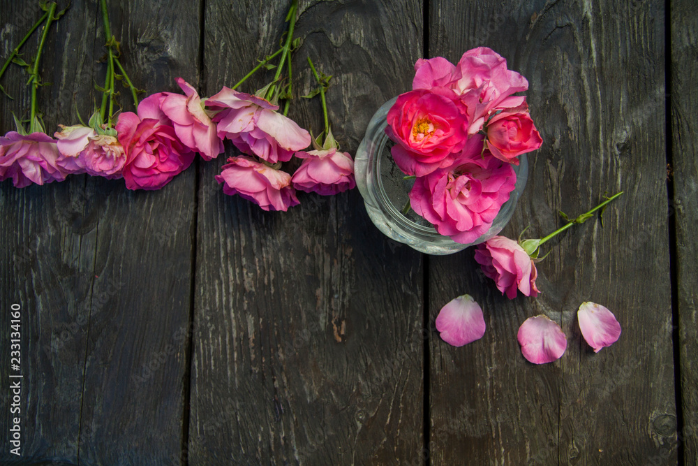 Pink rose bouquet on wooden rustic background Pink rose bouquet on wooden rustic background