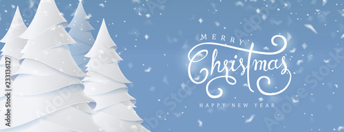 Merry Christmas and Happy New Year background for Greeting cards with christmas tree landscape and snowing paper art style.Calligraphy of christmas.Vector illustration.