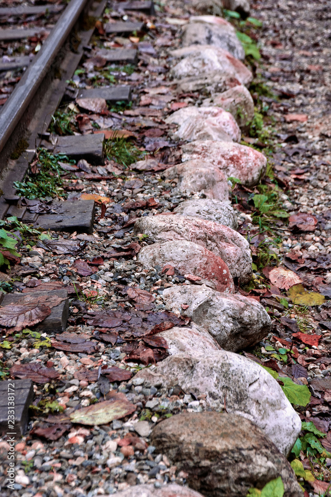 Fragment of an old railway paved with stones Fragment of an old railway paved with stones