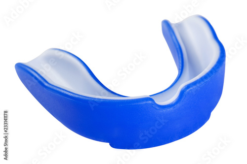 blue sports mouth guard, protection of teeth in boxing of rubber on white background, isolate