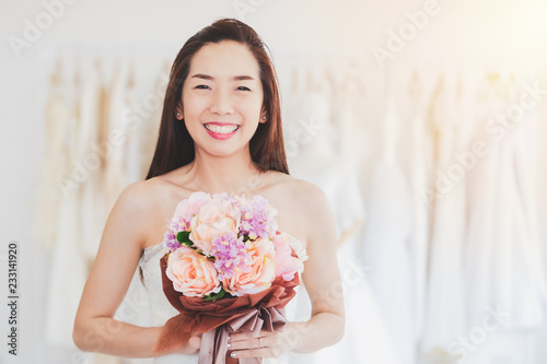 Portrait Asian women cheerful happiness in wedding fashion store