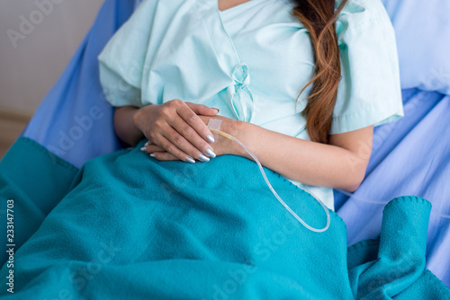 Hand patient woman receiving with saline solution and treatment photo