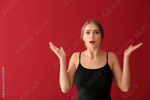 Emotional young woman after...