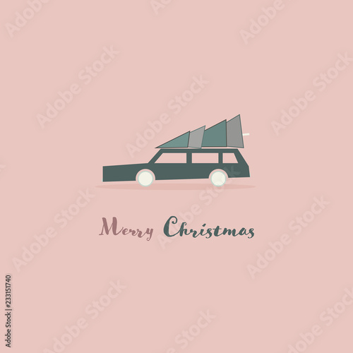 Christmas time. Family car transporting a Christmas tree. Text : Merry Christmas