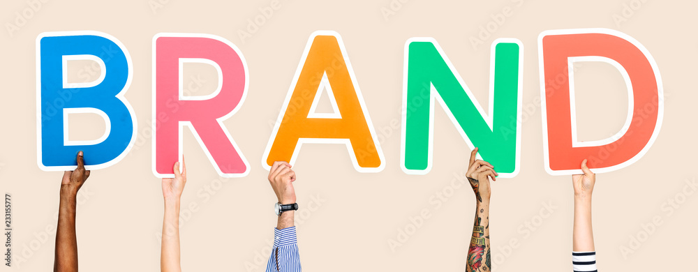 Diverse hands holding the word brand Diverse hands holding the word brand